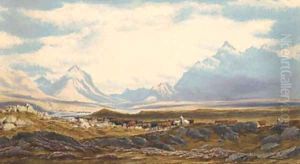 An extensive view of the Isle of Skye with cattle in the foreground