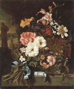 Carnations, Lilies, Narcissi And
 Other Flowers Tied With A Blue Ribbon On A Stone Ledge, A Park Beyond