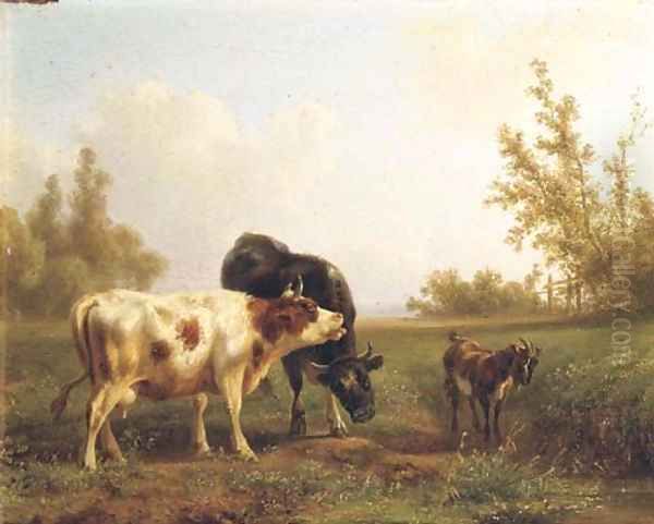 Cows and a goat in a sunlit meadow - view 1