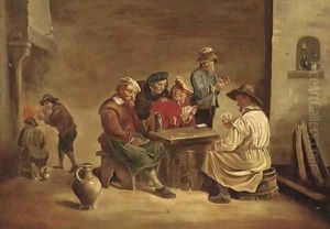 Boors playing cards in a tavern