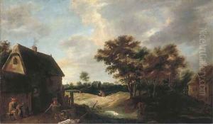A wooded village landscape with a peasant resting outside a farmhouse