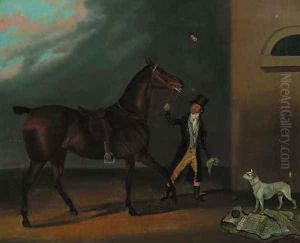 A bay racehorse with a groom and a dog outside a stable