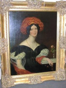 Three-quarter Length Portrait Of A Lady Seated, One Arm Resting On A Marble Ledge