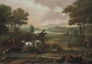 A Staghunt, With Hounds And 
Huntsmen Closing In, In An Extensive River Landscape With A Town And 
Mountains Beyond