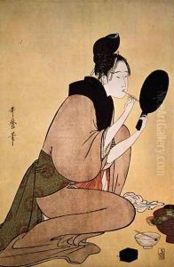 Courtesan applying lip rouge by Kitagawa Utamaro