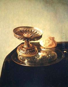 Still life with a pewter plate and bread by Jan Jansz. den Uyl