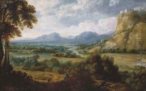 An extensive river landscape with a herdsman resting on a path, mountains beyond by Lucas Van Uden