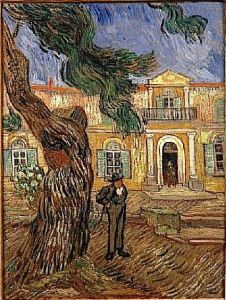 Pine Trees With Figure In The Garden Of Saint Paul Hospital by Vincent Van Gogh