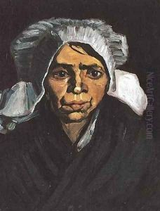 Head Of A Peasant Woman With White Cap I by Vincent Van Gogh