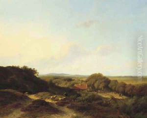 A panoramic dune landscape with a sportsman in the foreground
