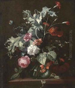 Roses, morning glory and other flowers in a glass vase on a wooded ledge Roses, morning glory and other flowers in a glass vase on a wooded ledge