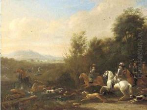 A wooded landscape with a stag hunt