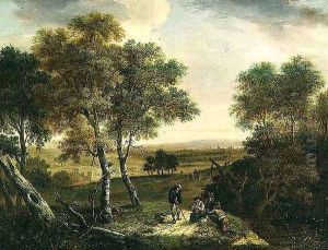 An extensive wooded landscape with peasants by a path, a town beyond