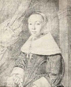 Portrait of a young lady, half-length, wearing a bonnet and a lace collar