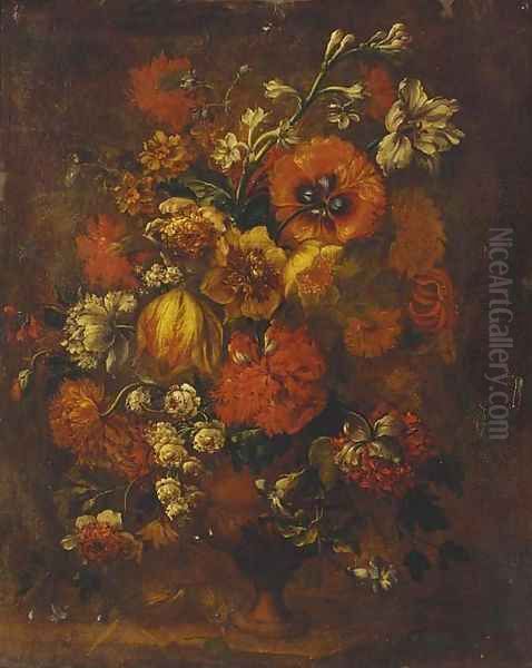 Carnations, tulips, narcissi, and other flowers in an urn on a ledge - view 1