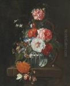 Flowers In A Glass Bowl On A Stone Ledge