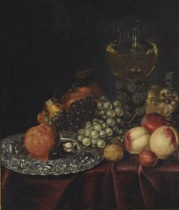 A Bread Roll And A Plum On A Silver Plate