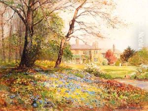 A woodland garden in Spring by Ernst Walbourn