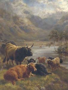 Highland cattle in a loch landscape