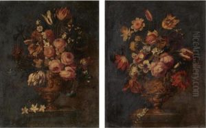 A Pair Of Still Lifes Of Various Flowers In Sculpted Urns, On Stone Plinths