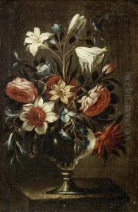 Tulips, Peonies, Carnations And Other Flowers In A Glass Vase On A Table