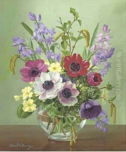 Anenomes, bluebells, primroses and catkins in a glass bowl