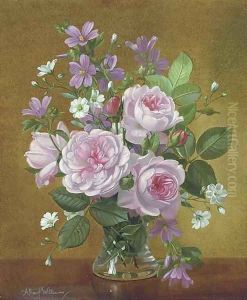 Peonies, bluebells, primroses and catkins in a glass bowl