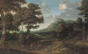 Huntsmen and their hounds on a path in a wooded landscape