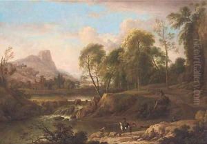 An extensive mountain landscape with horsemen on a track and bathers in a river, a town beyond