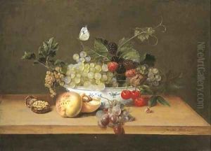 Grapes on the vine, whitecurrants, blackberries, cherries and a walnut in a porcelain bowl with peaches, grapes and a walnut