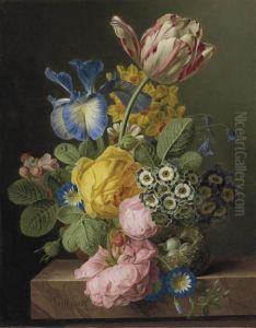 A Vase Of Flowers With A Bird's Nest On A Marble Ledge