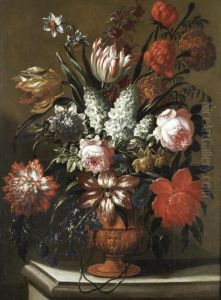 Roses, Tulips, Lilies And Other Flowers In A Terracotta Vase On A Stone Ledge