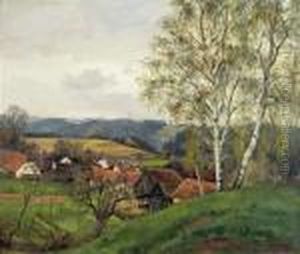 Dorf In Hugeliger Landschaft