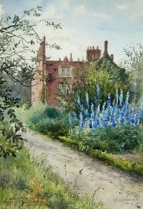 A Norfolk Country House With Blue Delphiniums In The Garden