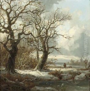 A winterlandscape with a traveller on a path by Pieter Lodewijk Francisco Kluyver