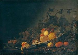 Still Life Of Quinces, Plums, Peaches And Grapes In A Silver Salver, Together With A Peach And A Peeled Lemon On A Silver Plate, A Knife, Grapes, Oranges, Lemons And Apricots On A Table Partly Draped With A Red Cloth by Abraham Van Calraet