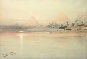 A View Of The Pyramids At Sunset