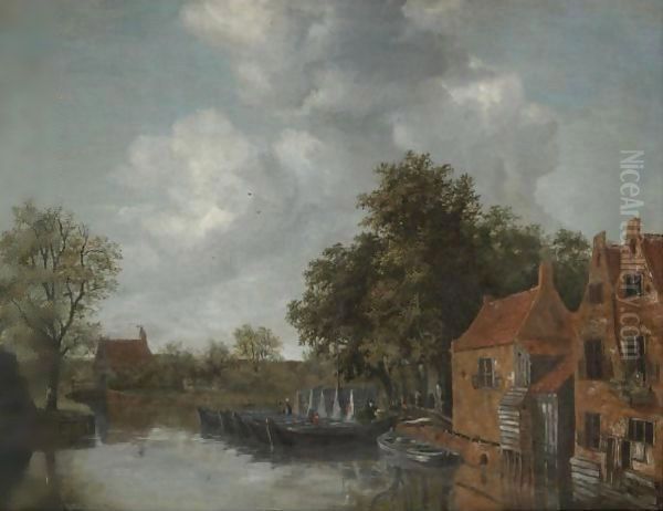A View On A Canal In A Dutch Village With Barges Moared On The Quay Near Houses - view 1