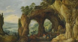 An Extensive River Landscape With Horsemen Before A Rocky Arch In The Foreground by Joos De Momper