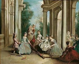 Children with their nurse playing on a hobby-horse on a terrace