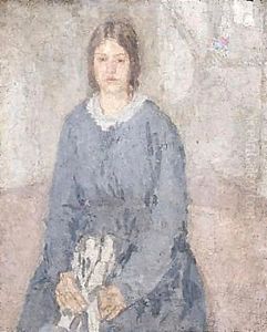 Young Woman Holding A Piece Of Sewing