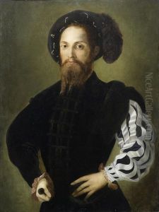 Portrait Of A Gentleman, Half-length, In Black Costume And A Black Plummed Hat by Nicolo dell' Abbate