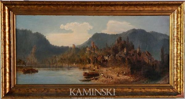 Village Along A River With People On A Road And Distant Mountains - view 1