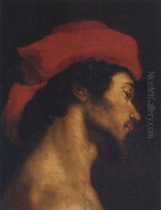 The Head Of A Young Man Wearing A Red Hat by Cristofano Allori
