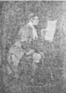 A Man Reading Music