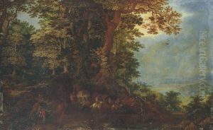An Extensive Landscape With Travellers And Wagons On A Forest Path by Denis van Alsloot