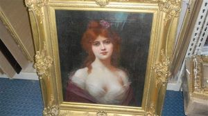 Portrait Of A Lady With Purple Flowers In Her Hair