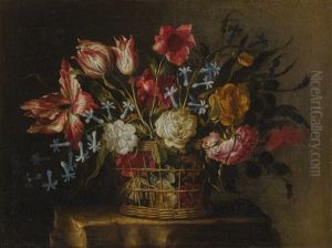 Still Life Of Tulips, Bluebells And Other Flowers In A Basket On A Stone Pedestal by Juan De Arellano