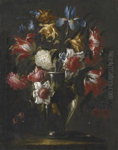 Blue Irises, Parrot Tulips, Anemones, Peonies And Other Flowers In A Glass Vase, On A Stone Ledge Blue Irises, Parrot Tulips, Anemones, Peonies And Other Flowers In A Glass Vase, On A Stone Ledge