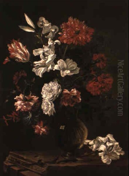 Flowers In Glass Vase On Stone Ledge - view 1